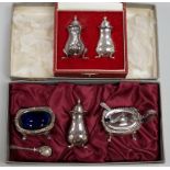 A cased modern silver three piece cruet set, Francis Howard Ltd, Sheffield, 1988 and a cased pair of