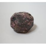 An unpolished and uncut garnet boulder, approx. 6cm.