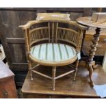 A late Victorian inlaid mahogany tub framed elbow chair, width 61cm, depth 45cm, height 70cm