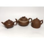 Three Chinese Yixing dark brown zisha clay teapots, one with marbled clay band Provenance- from a