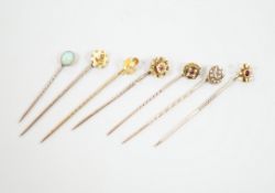 Three early 20th century 15ct stick pins including gem, three similar 9ct stick pins and one other