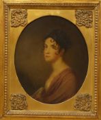 Early 19th century school, circa 1820, oval oil on board, Portrait of a lady, indistinctly inscribed