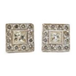 A modern pair of 750 white metal and square diamond cluster ear studs, 7mm, gross weight 2.2 grams.