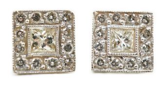A modern pair of 750 white metal and square diamond cluster ear studs, 7mm, gross weight 2.2 grams.