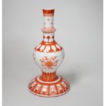 A Chinese candlestick hand painted with flowers with fitted case, 23cm high