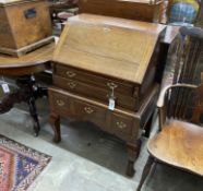 A reproduction Queen Anne style walnut bureau, width 73cm, depth 48cm, height 102cm