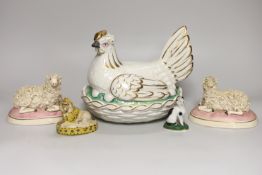 A Victorian earthenware chicken tureen, and four small ceramic animal models, tureen 18cm high