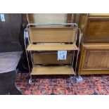 A 1960's Foldamatic chrome and formica folding tea trolley, height 77cm