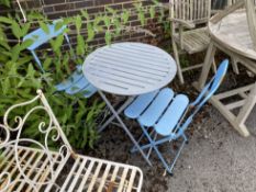 A circular metal folding garden table, diameter 60cm, height 70cm and two chairs