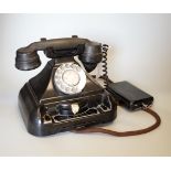 A 1930s GPO 200 series black Bakelite telephone with unusual switchboard exchange panel above