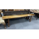 A 19th century Provincial oak bench, length 214cm, width 29cm, height 55cm