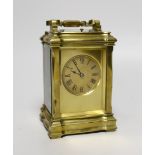 A brass repeating carriage clock by Richard & Co., with Roman numerals, 17cm high