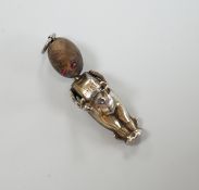 A WWI white metal and wood 'Fums Up' pendant charm, overall 36mm.