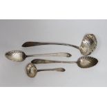 A George IV silver bright cut engraved soup ladle, with fluted bowl, Lawrence Nolan, Dublin, 1827,