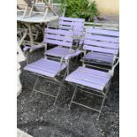 Four wrought iron and slatted wood folding garden chairs