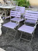 Four wrought iron and slatted wood folding garden chairs