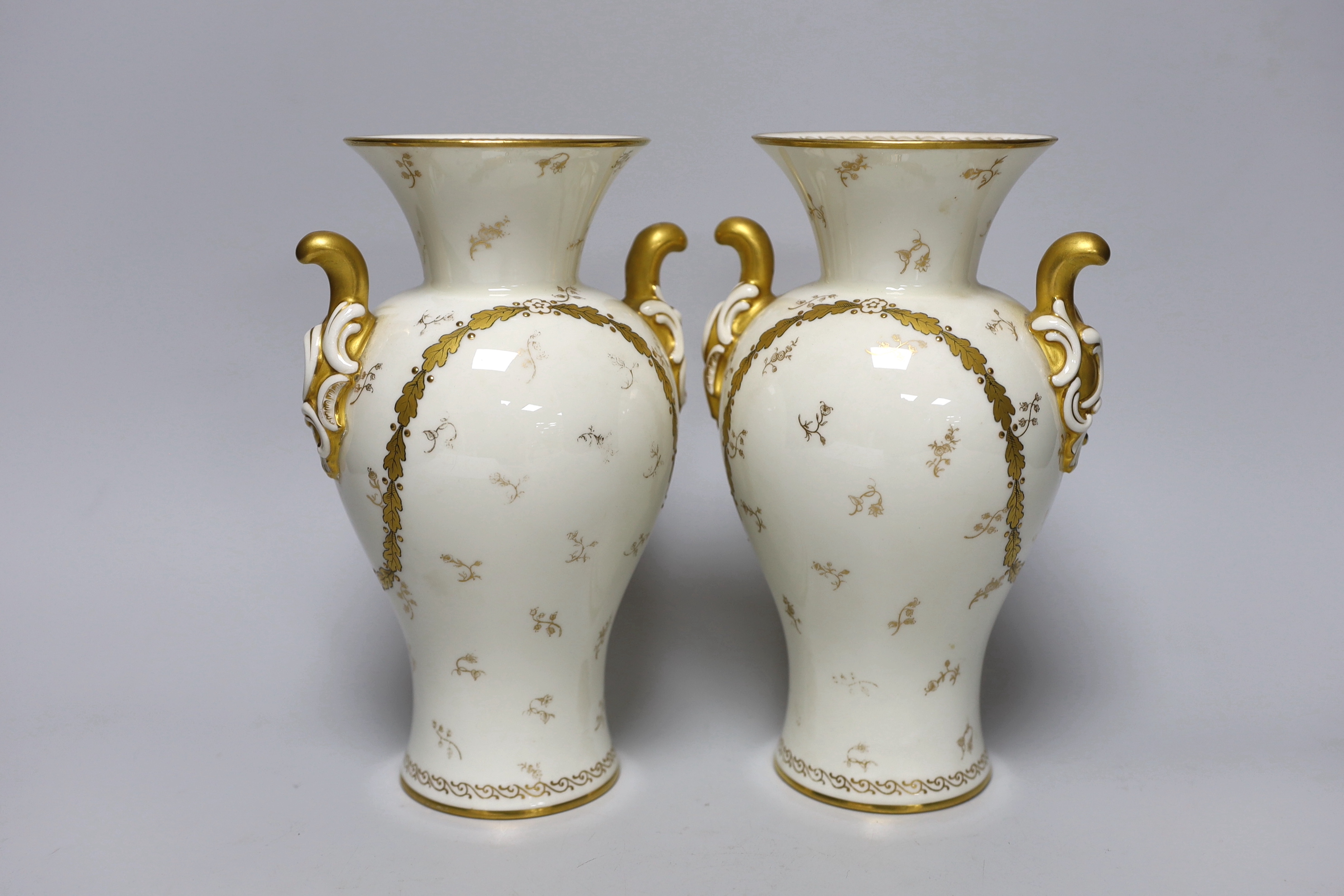 A pair of Royal Worcester vases with gilded decoration and still life panels signed W A Hawkins, - Image 2 of 4