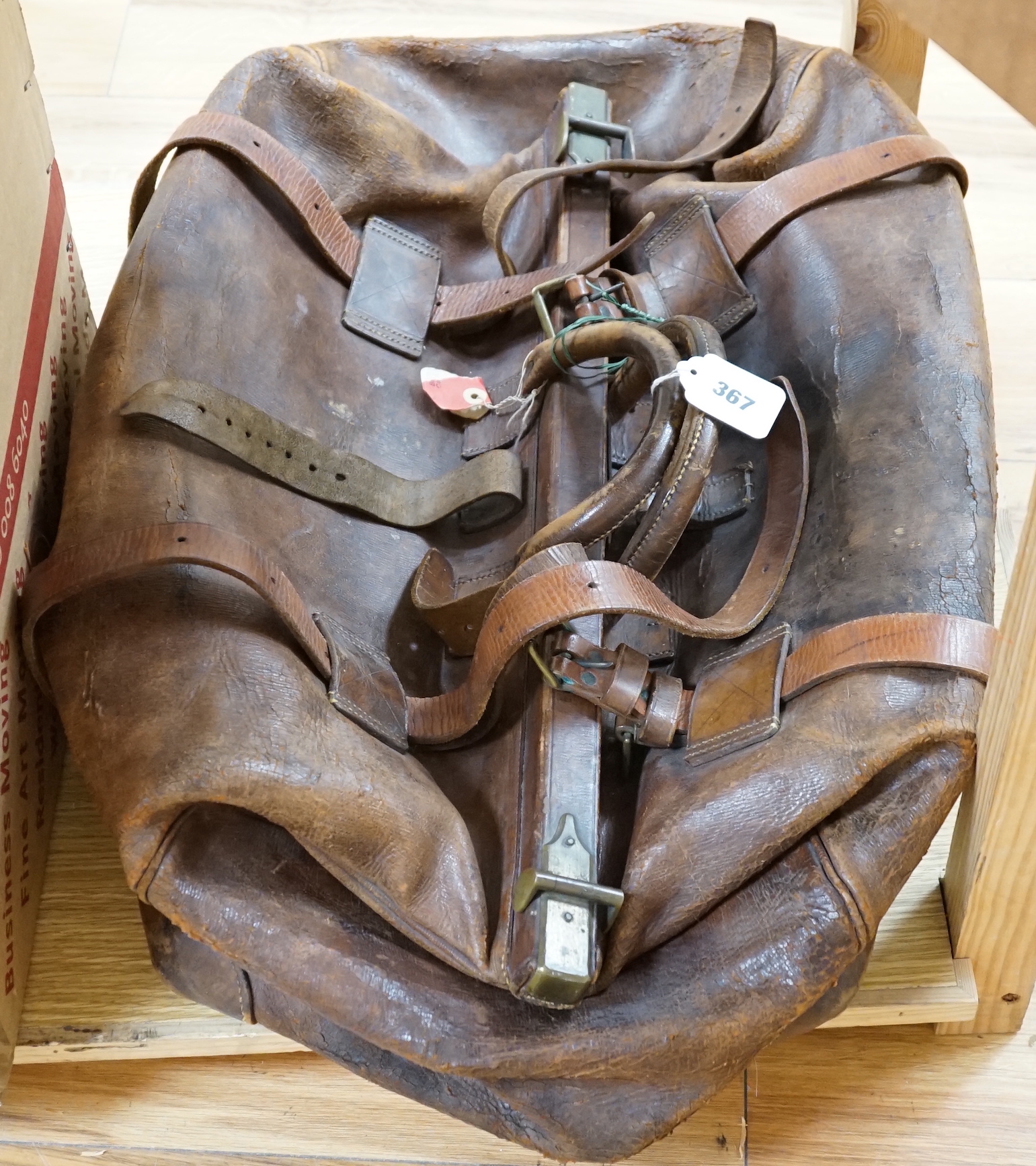 A large leather Gladstone bag,