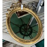 A pair of Victorian style gilt and composition oval mirrors, width 48cm, height 65cm