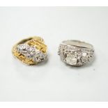 A mid 20th century white metal and single stone diamond set dress ring with diamond chip setting,