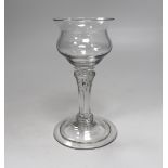 An English lead crystal champagne or sweetmeat glass c.1740, with double ogee bowl, with collar