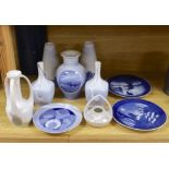 Two pairs of Royal Copenhagen vases, three others and three plates, with decorations including
