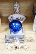 Ten sundry items including a small witch’s ball, three cherub figures with Meissen marks, a