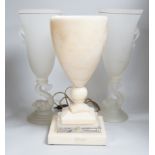A glass uplighter table lamp in the style of alabaster and two frosted glass dolphin vases