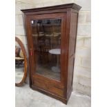 A 19th century Dutch oak glazed bookcase, length 105cm, depth 46cm, height 191cm