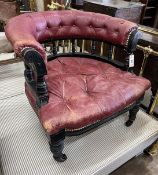 A late Victorian ebonised buttoned burgundy leather tub framed chair, width 66cm, depth 67cm, height