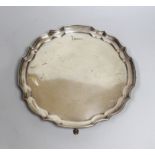 An Elizabeth II silver salver, with pie crust border, on four hoof feet, CRS Ltd, Sheffield, 1979,