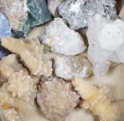 A quantity of quartz and various crystal specimens, the largest approximately 19cm wide