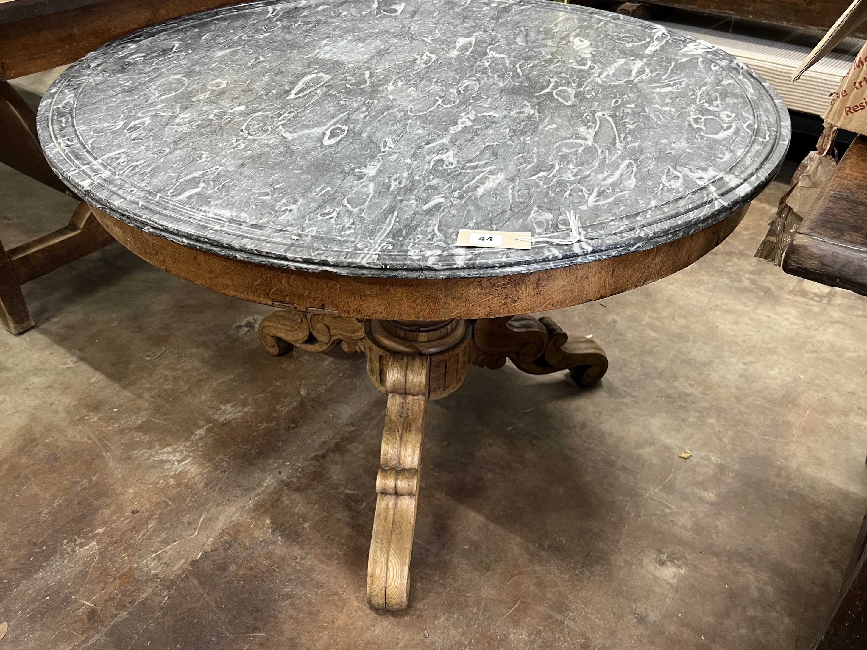 A late 19th century French circular oak marble top centre table, diameter 100cm, height 67cm