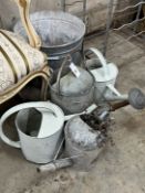 Four vintage galvanised watering cans and a circular container, largest diameter 42cm, height 34cm