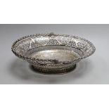 A George pieced silver oval cake basket, on pierced oval foot, William Plummer, London, 1775, length