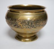 A Chinese brass bowl, 13cms high