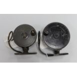 Two Malloch’s Patent fishing reels, largest reel 10cm diameter