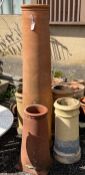 Five terracotta and earthenware chimney pots, largest height 154cm