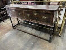 A 17th century and later oak and fruitwood low dresser, fitted two drawers, width 153cm, depth 35cm,