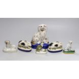 Six Staffordshire style flatback animals including three dogs, two rabbits and a cat group,