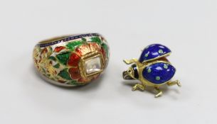 A modern 18ct gold and three colour enamel set small bug brooch, 13mm, gross weight 3.1 grams and an