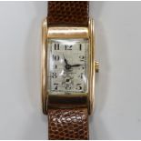 A gentleman's 1930's 9ct gold Wyler rectangular manual wind wrist watch, with Arabic dial and