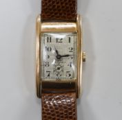 A gentleman's 1930's 9ct gold Wyler rectangular manual wind wrist watch, with Arabic dial and