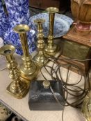 Two pairs of 19th century brass candlesticks and a Coalbrookdale iron tobacco box and cover, tallest