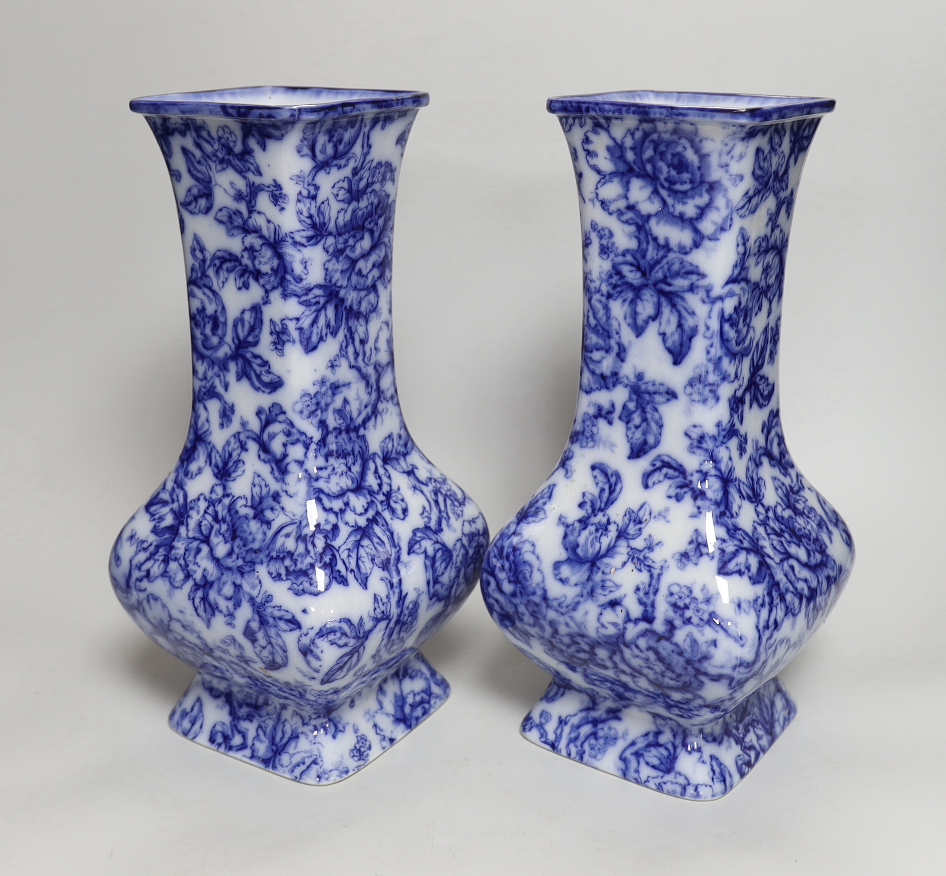 A pair of Losol ware blue and white vases, a slipware jug, a faience candle holder and a Chinese tea - Image 3 of 6