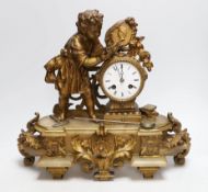 A French bronze and onyx mantel clock by Japy Frere with figure of a child reading, striking on a