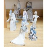 Ten Lladro figures including Don Quixote and seated lady with embroidery, the largest 30cm high