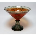 A Kosta Boda orange and green glass pedestal bowl, signed KOSTA BODA / K. ENGMAN 7050647, 26cm high