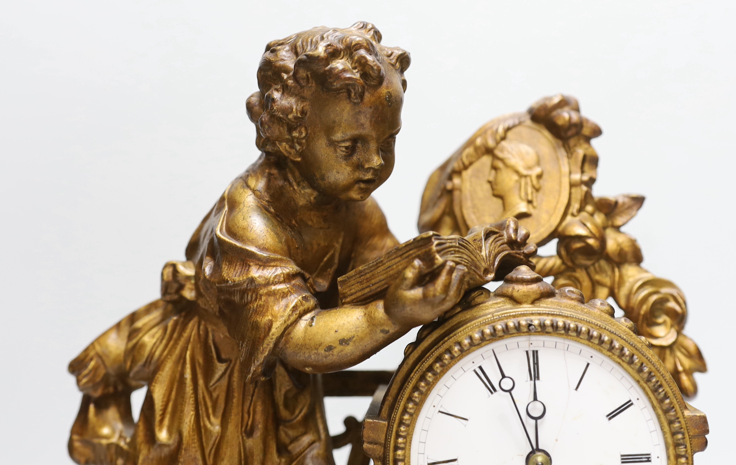 A French bronze and onyx mantel clock by Japy Frere with figure of a child reading, striking on a - Image 2 of 3
