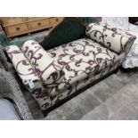 A contemporary upholstered day bed, length 160cm, width 64cm, height 76cm
